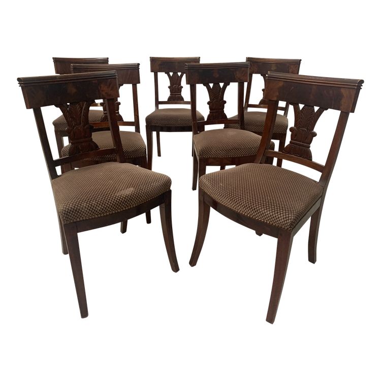 Suite of seven solid mahogany chairs XIX century