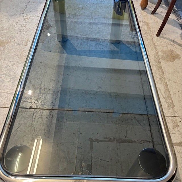 Smoking coffee table 1970s chrome and smoked glass - model Sesann Frattini for Cassina .mis120 x 60 x 3