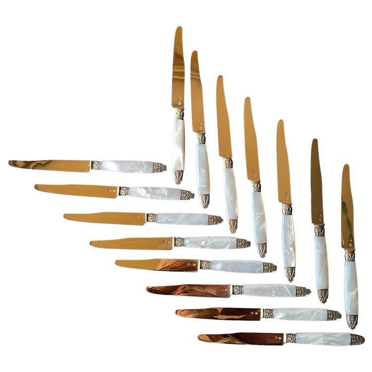 15 mother-of-pearl and vermeil fruit knives.