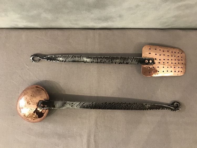 An 18th century copper ladle and skimmer