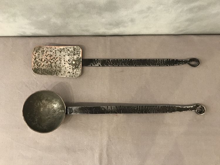An 18th century copper ladle and skimmer