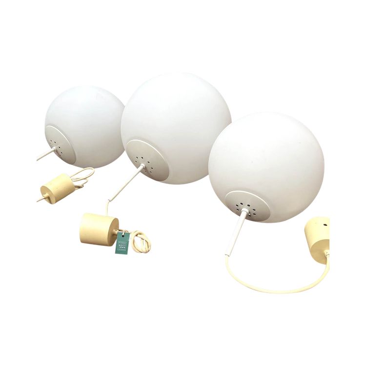 Three large opaline glass lamps