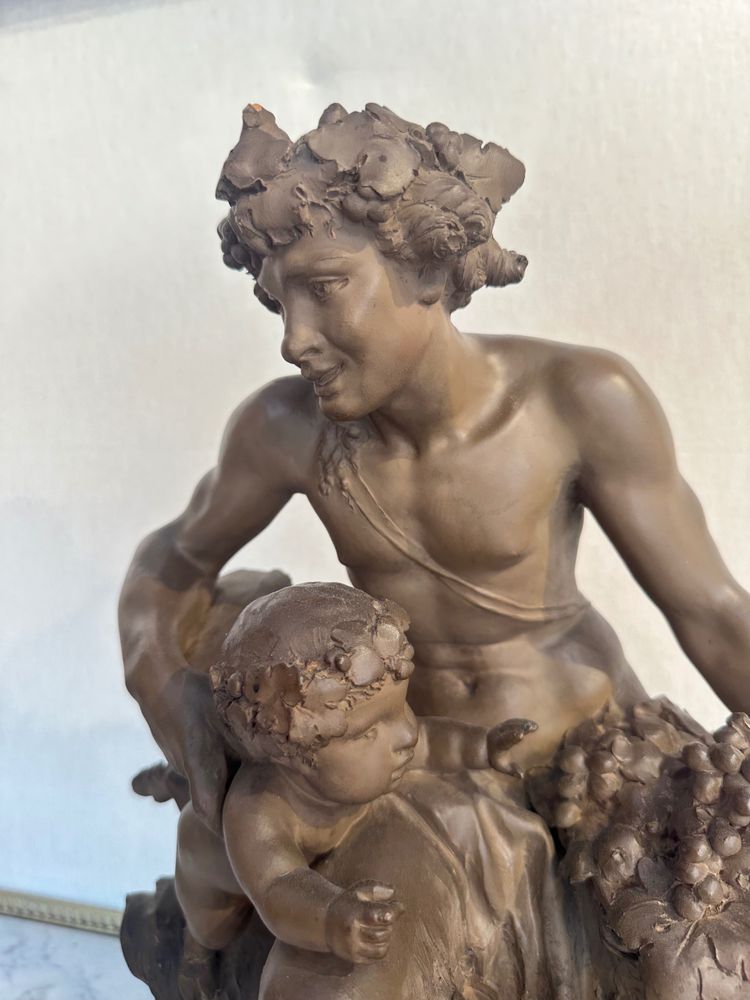 Terre Cuite By Clodion Representing A Faun Surrounded By Puttis