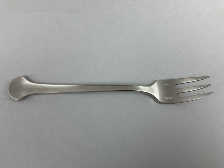 Eight cake forks, steel, Christophe sigma.