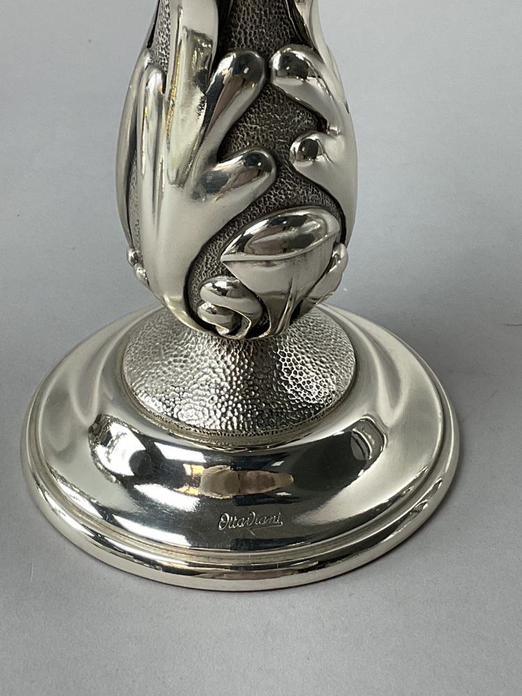 Pair of silver-plated candlesticks