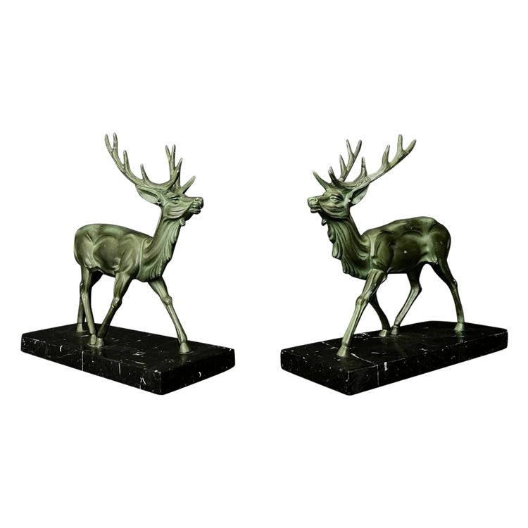 Paire de serre-livres Art Déco – Cerfs en régule à patine vert antique – Socles en marbre noir