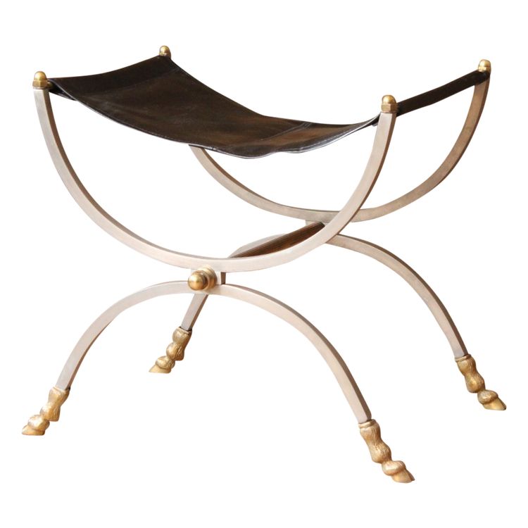 Curule stool seat in polished wrought iron with brass ornamentation, 20th century