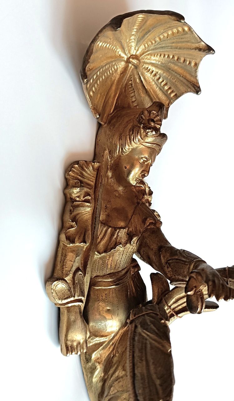 Pair of Regency style gilt bronze wall lights