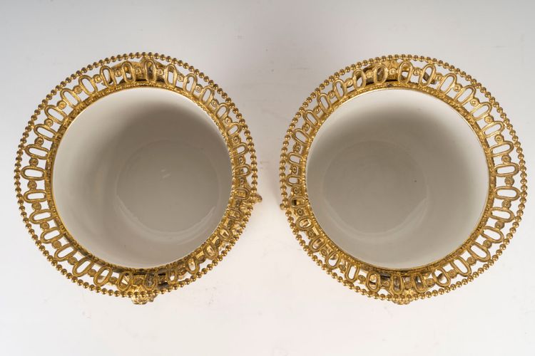 Pair of porcelain and gilt bronze planters, late 19th century