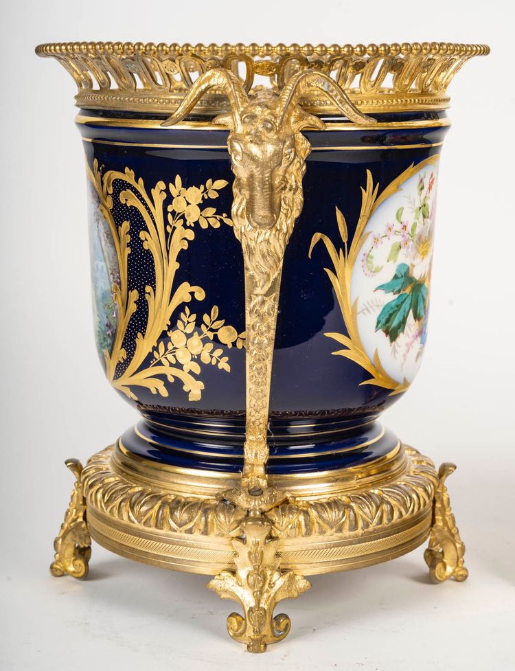 Pair of porcelain and gilt bronze planters, late 19th century