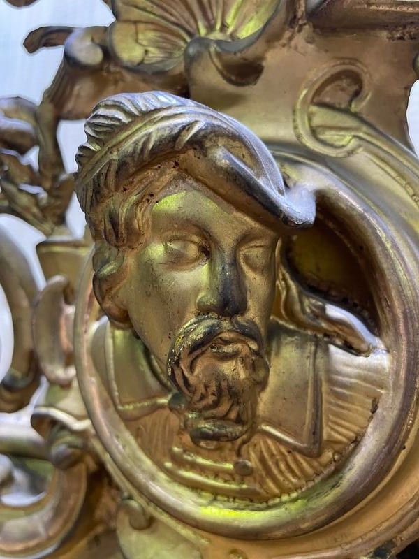 Napoleon III era mirror with a pediment with the gold leaf