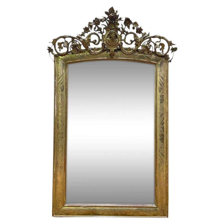 Napoleon III era mirror with a pediment with the gold leaf