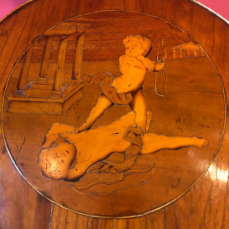 Marquetry pedestal table with putti, late 19th century