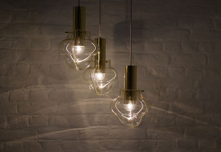 Venini amber three-globe pendant light