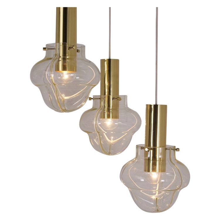 Venini amber three-globe pendant light