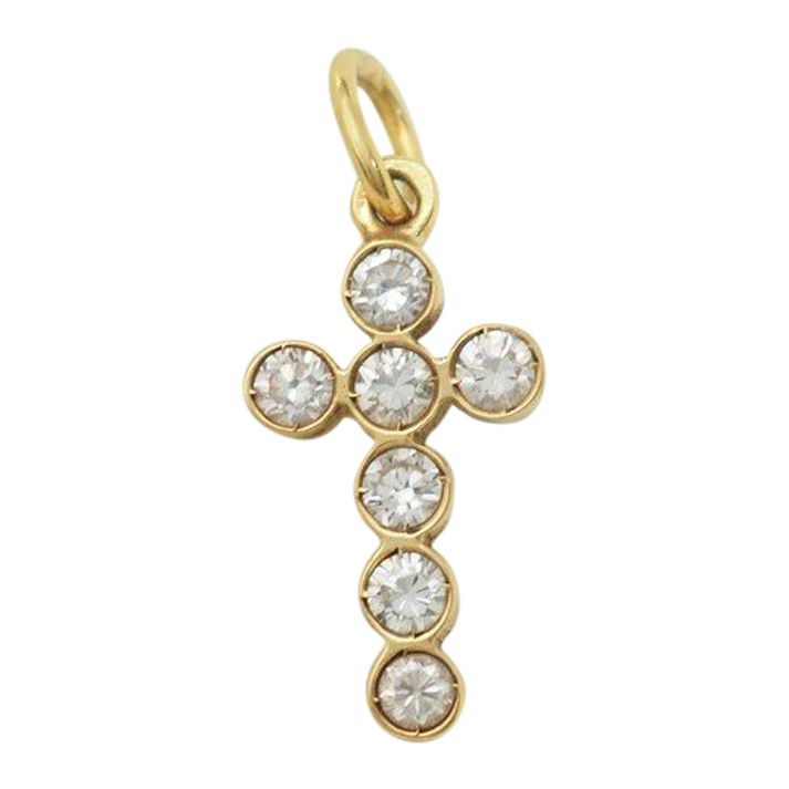Pendentif croix en or jaune et diamants 0.40ct