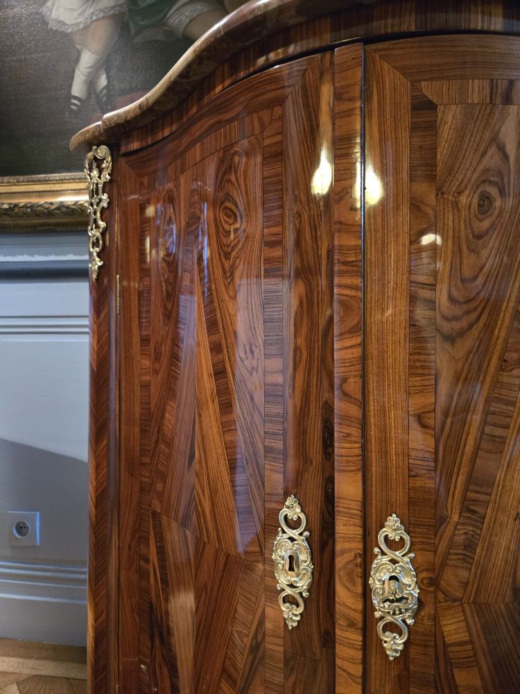 Pair of Regency corner cabinets with support height in violet wood.