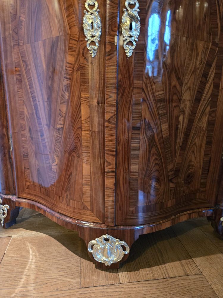 Pair of Regency corner cabinets with support height in violet wood.