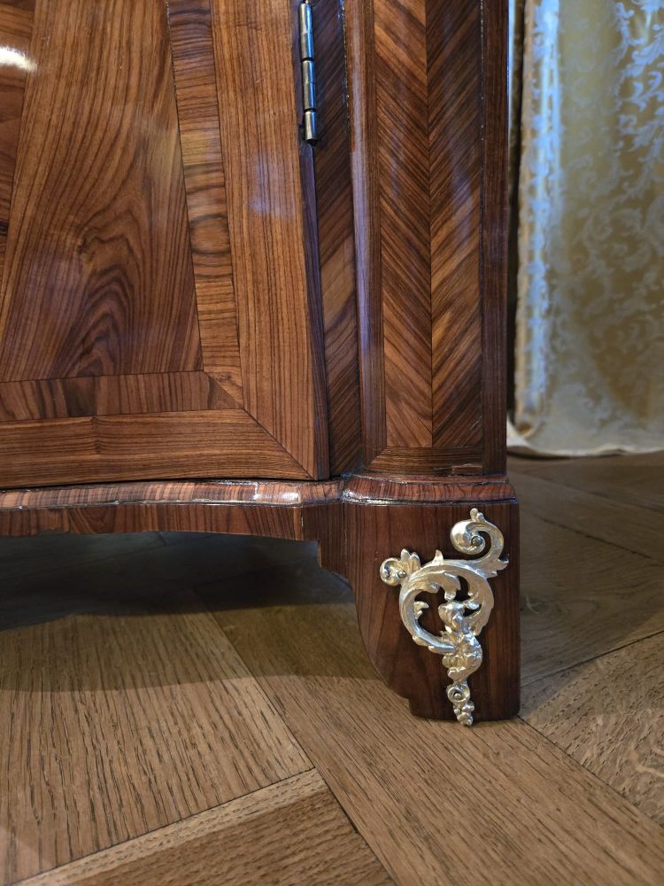 Pair of Regency corner cabinets with support height in violet wood.