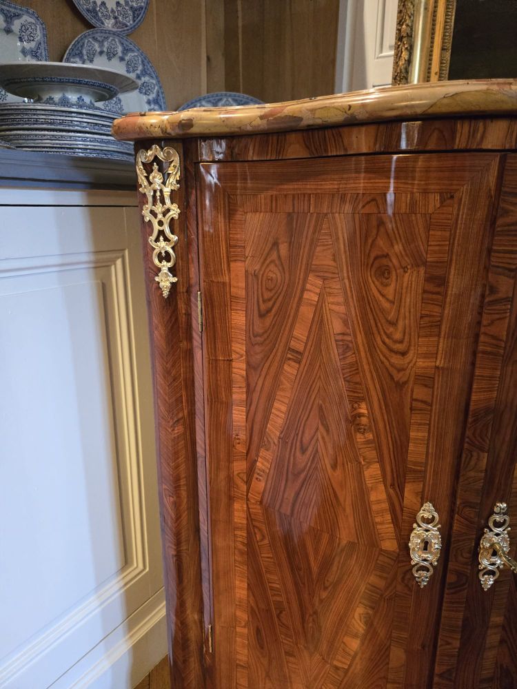 Pair of Regency corner cabinets with support height in violet wood.