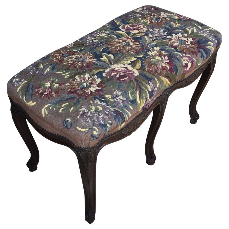 A Louis XV bench with its Aubusson tapestry