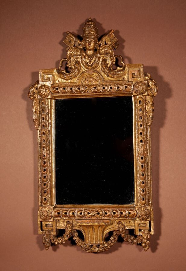 Papal interest: a beautiful mirror decorated with the papal coat of arms and two keys, last quarter of the 18th century