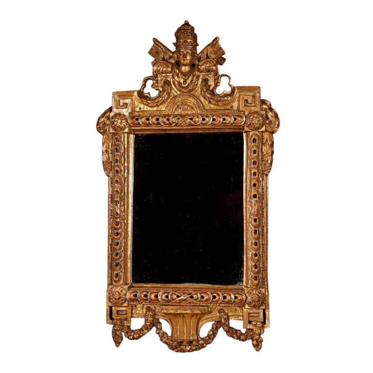 Papal interest: a beautiful mirror decorated with the papal coat of arms and two keys, last quarter of the 18th century