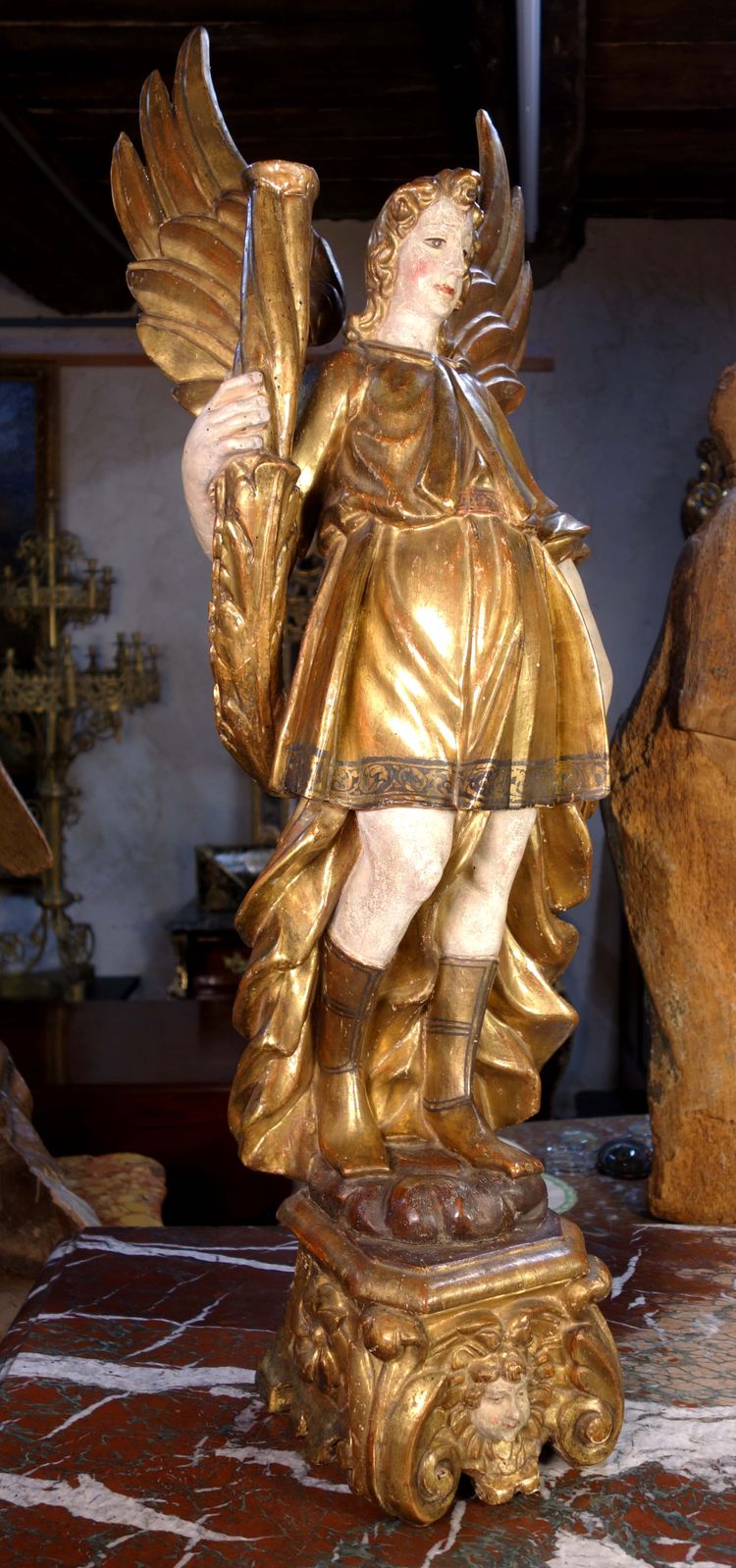 Large pair of gilded wooden torch-bearing angels, 18th century