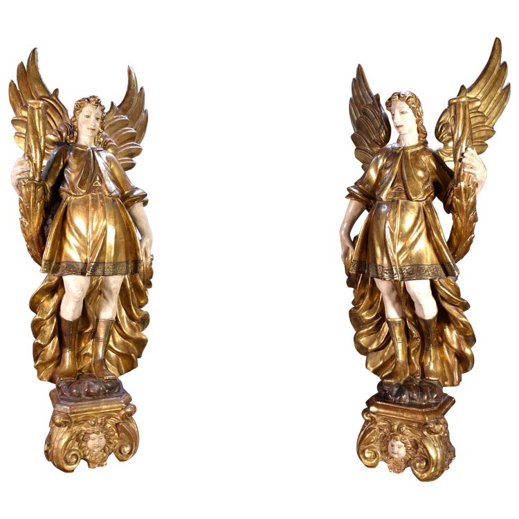Large pair of gilded wooden torch-bearing angels, 18th century