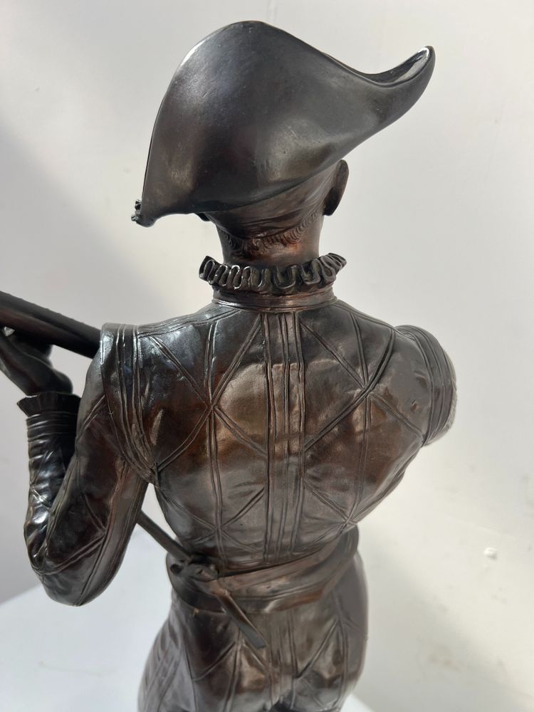 Il gruppo musicale Arlecchino in bronzo con patina marrone di DEBUT Marcel