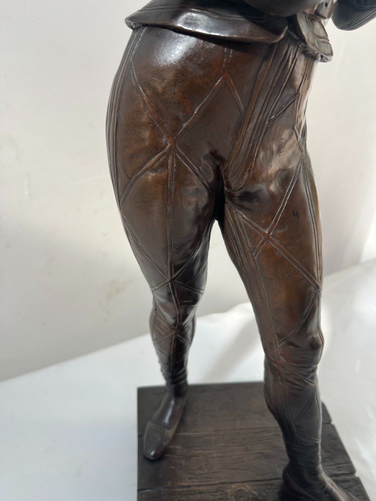 Il gruppo musicale Arlecchino in bronzo con patina marrone di DEBUT Marcel