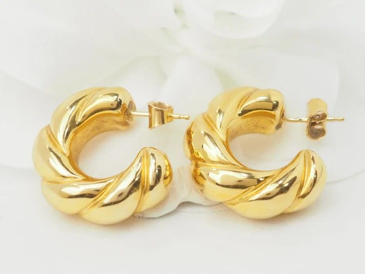 Boucles d'oreilles créoles torsadées en or jaune