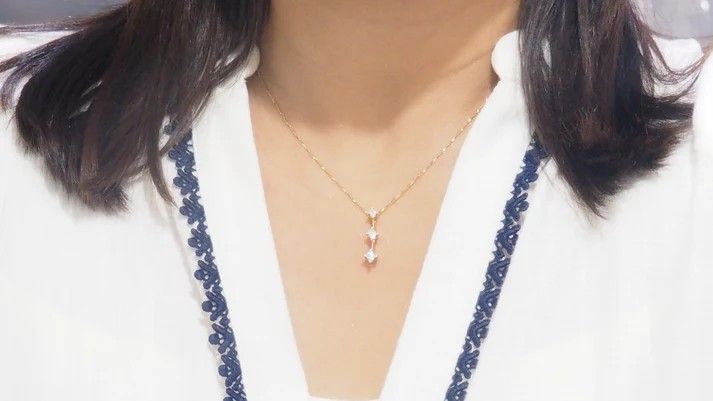 Collier trilogie en or jaune et diamants princesse