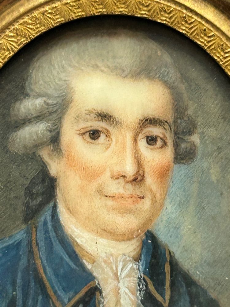 Miniature portrait of a man in a blue jacket from the late 18th century