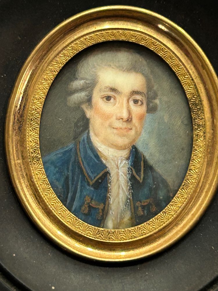 Miniature portrait of a man in a blue jacket from the late 18th century