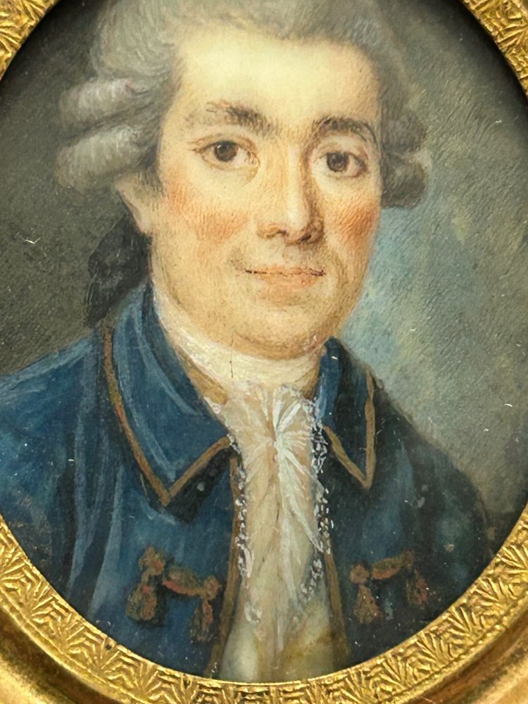 Miniature portrait of a man in a blue jacket from the late 18th century