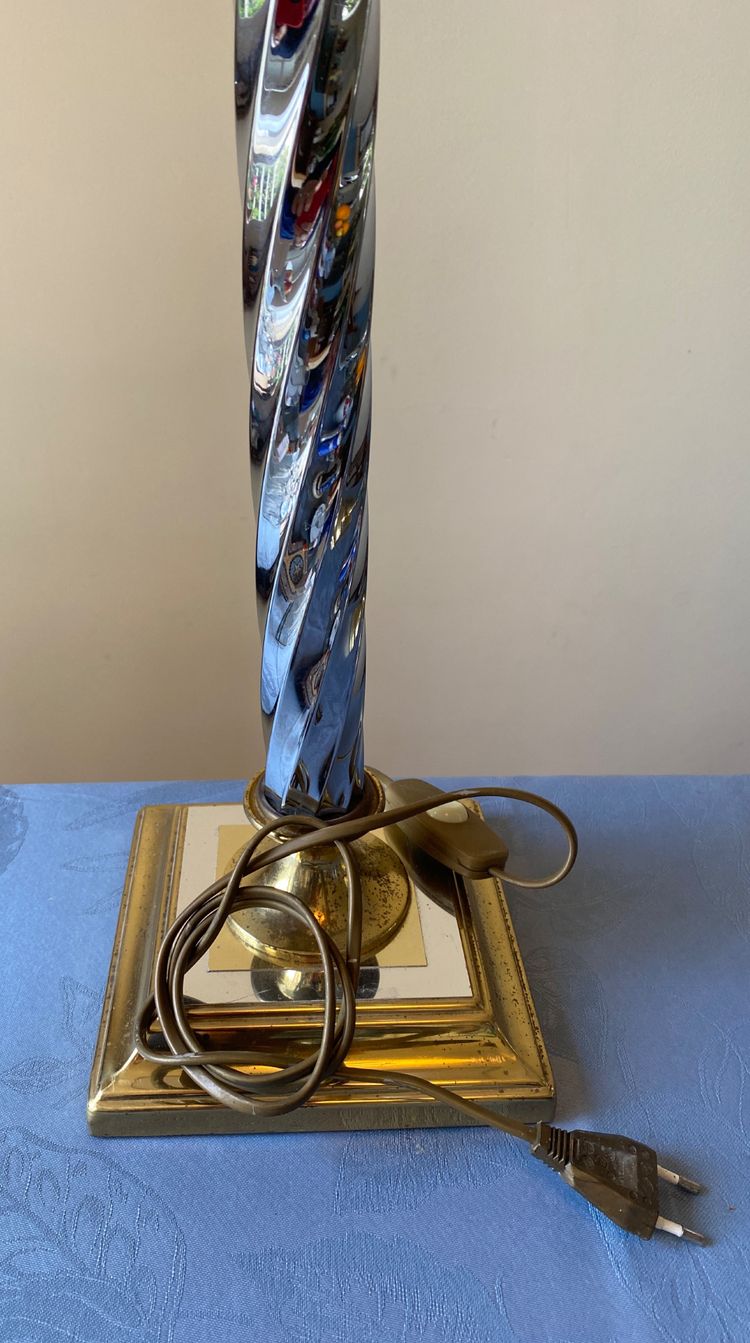 Pair of lamps. Twisted shaft. Chrome and gilded metal. In the style of R. Regarde.