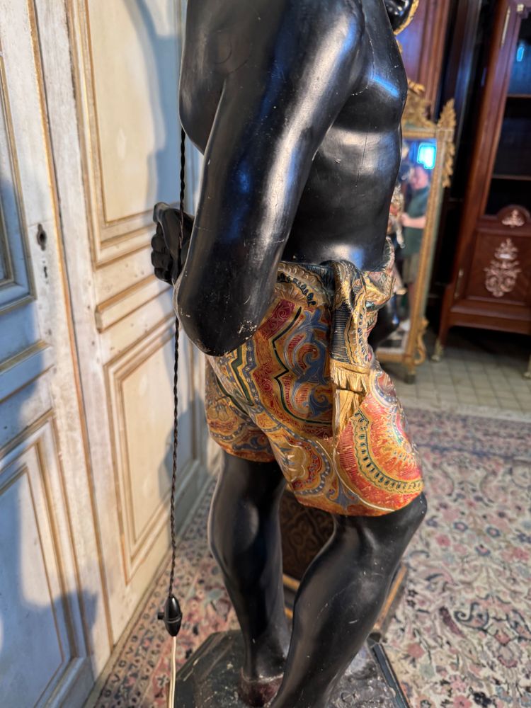 Pair of Nubian wooden torch holders from Venice, 19th century