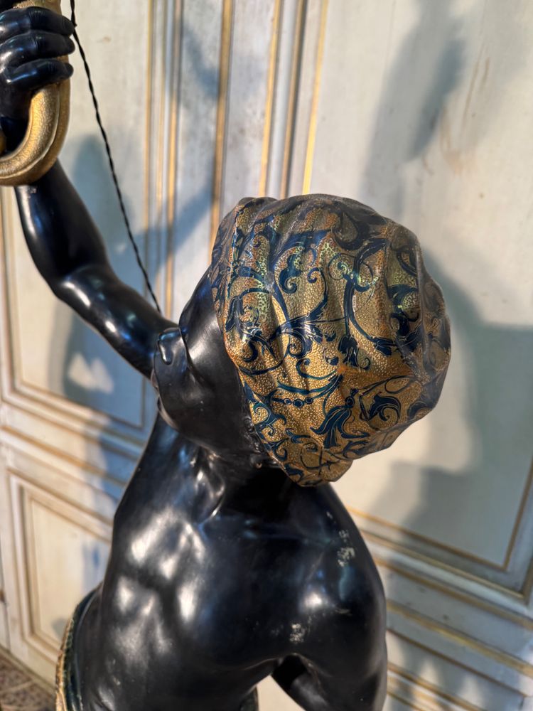 Pair of Nubian wooden torch holders from Venice, 19th century
