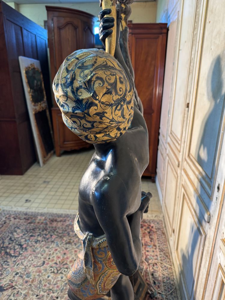 Pair of Nubian wooden torch holders from Venice, 19th century