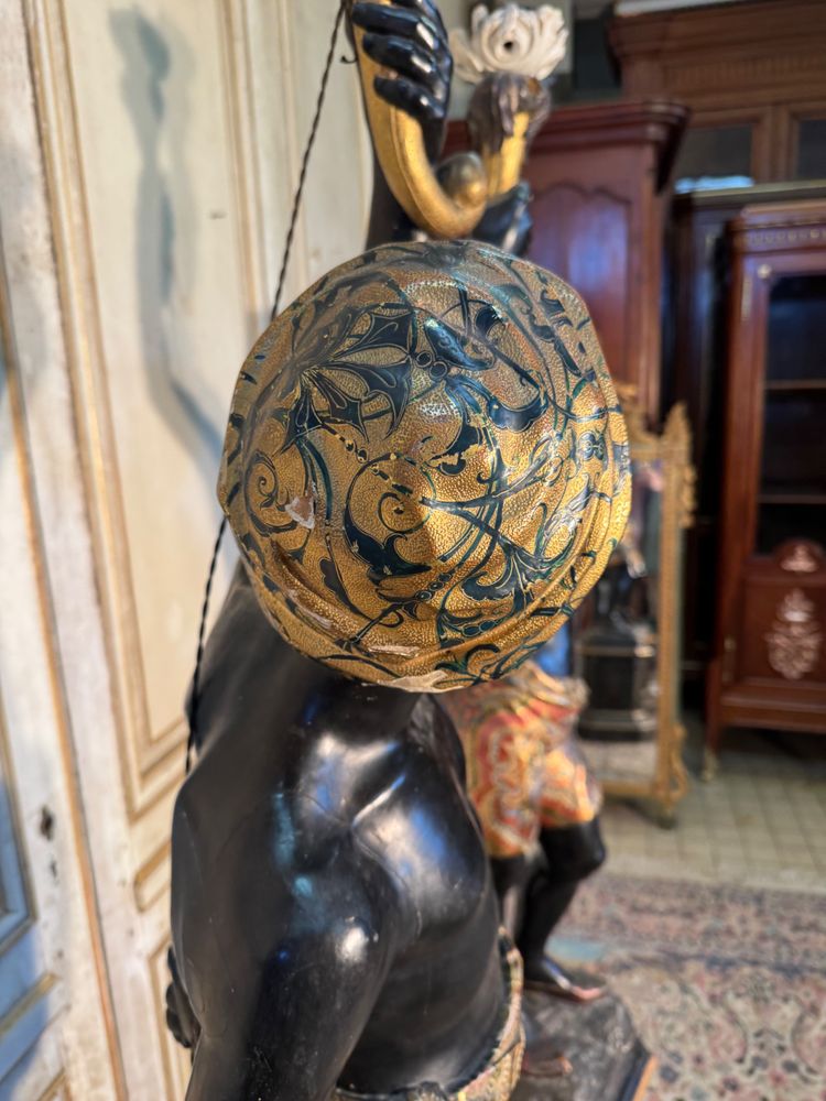 Pair of Nubian wooden torch holders from Venice, 19th century