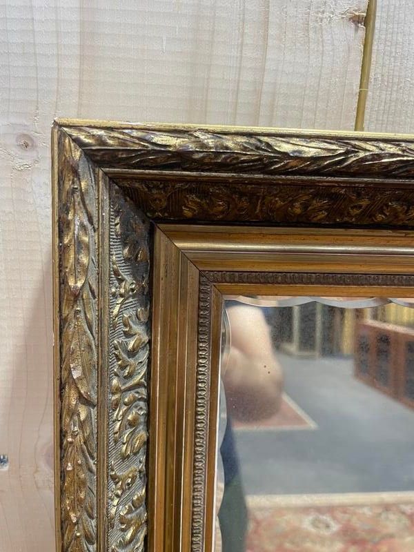 Miroir en bois doré de style Empire 