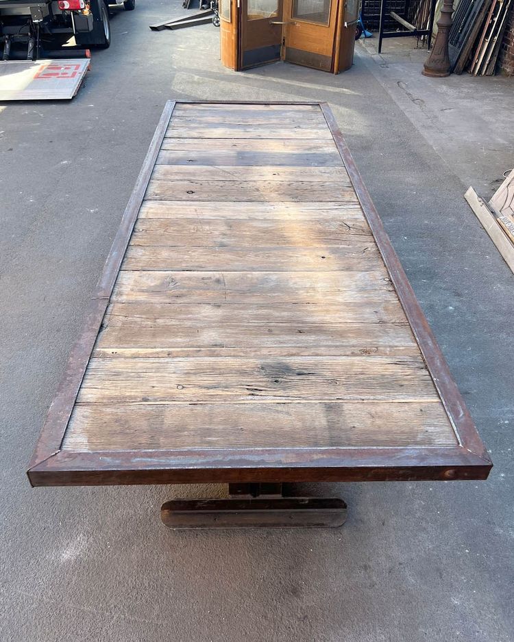 Table with oak top and cast iron base