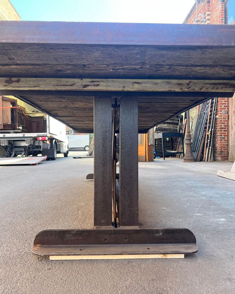 Table with oak top and cast iron base