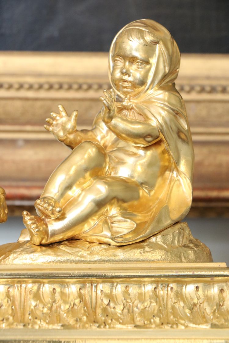 Pair of Louis XVI gilt bronze andirons