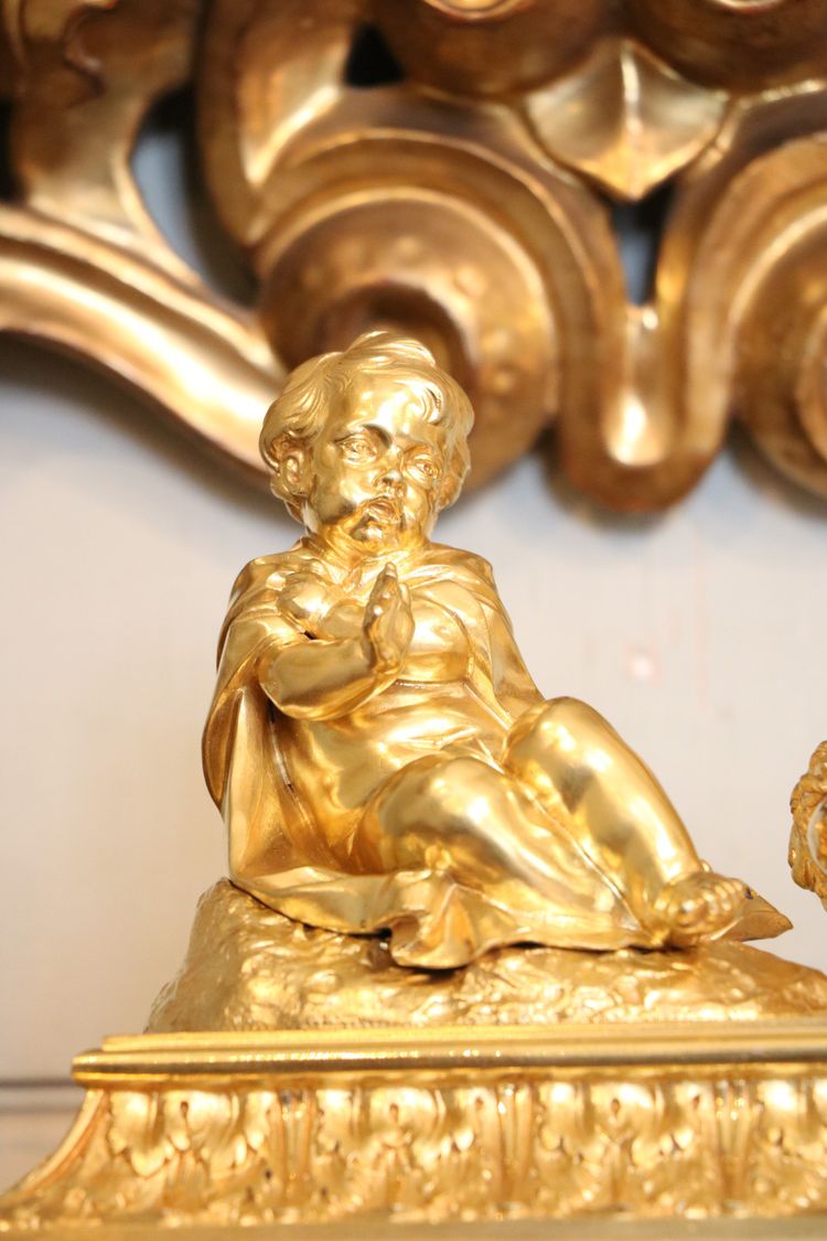 Pair of Louis XVI gilt bronze andirons