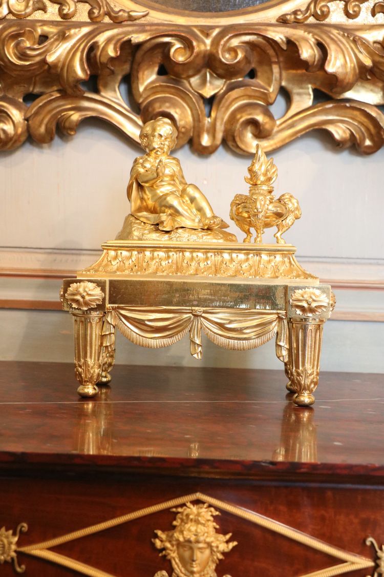 Pair of Louis XVI gilt bronze andirons