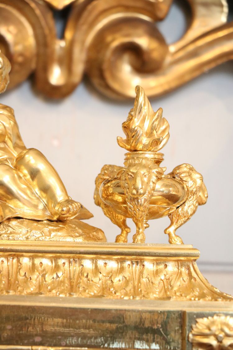 Pair of Louis XVI gilt bronze andirons