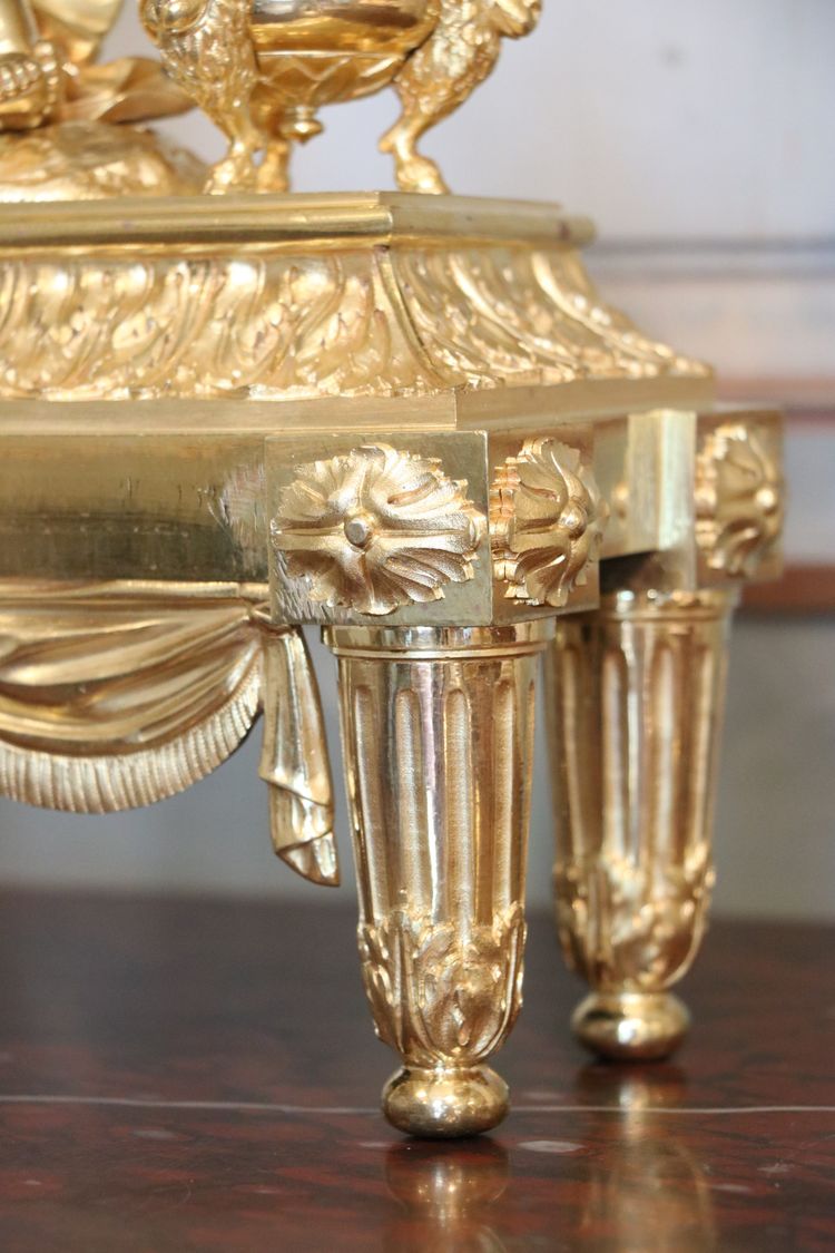 Pair of Louis XVI gilt bronze andirons