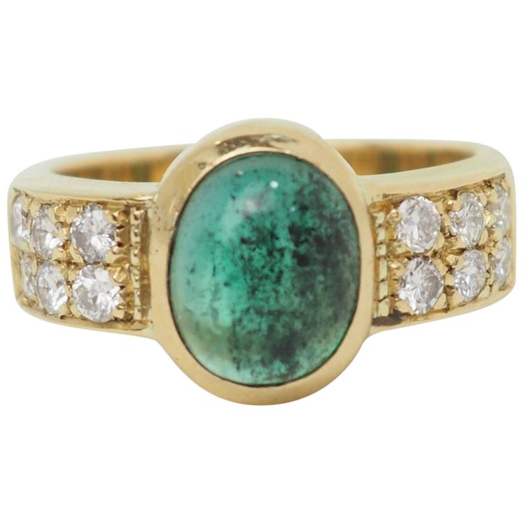 Anello in oro giallo e smeraldo